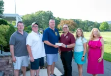 
			
				                                Shown from left: Luzerne County District Attorney Samuel M. Sanguedolce; Detectives Association representatives Charlie Casey and James Noon; Foundation President Girard J. Mecadon; Foundation Vice President Qiana Murphy Lehman; and former Foundation Vice President Cheryl Sobeski-Reedy.
                                 Submitted Photo

			
		